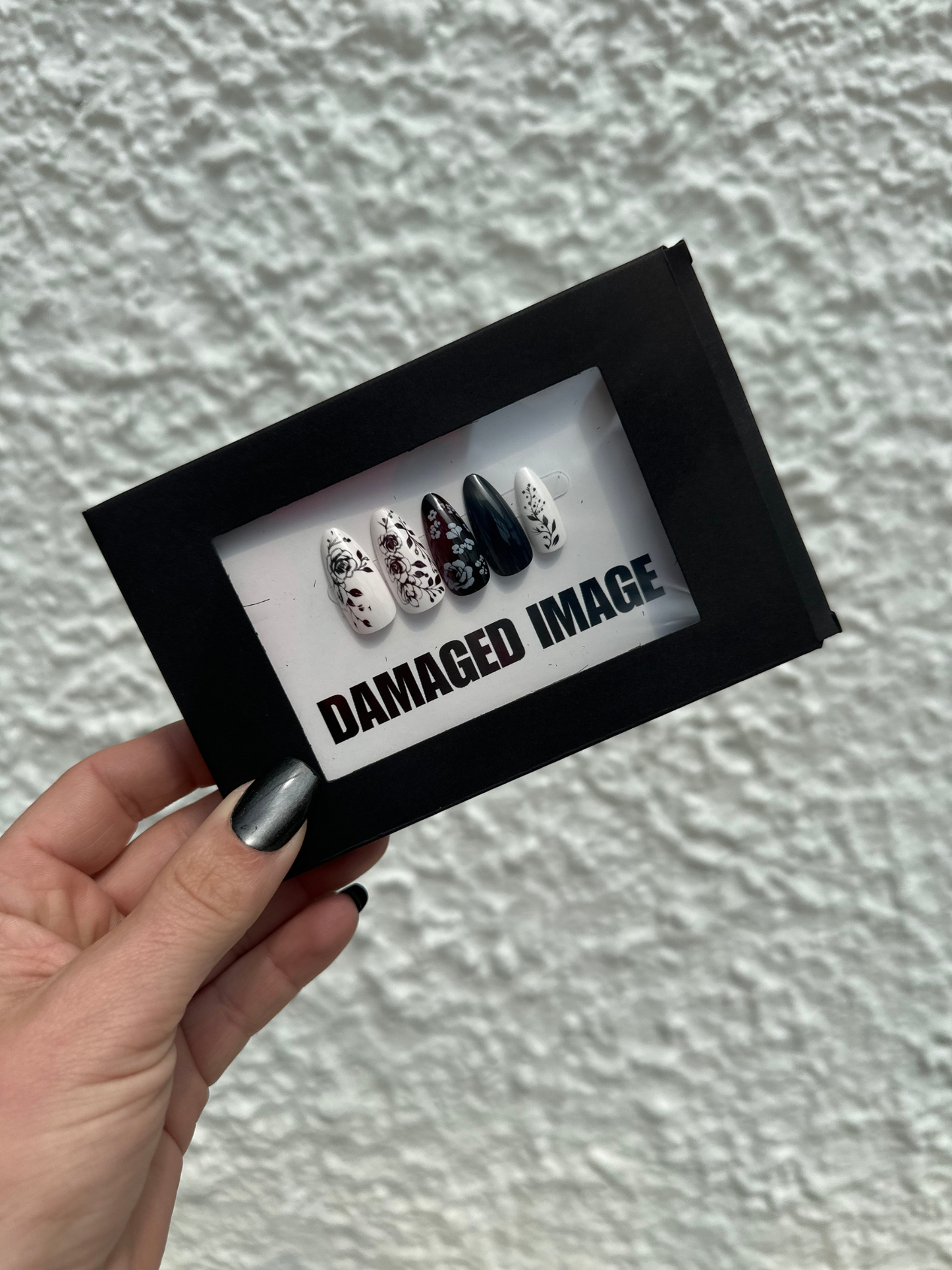 DAMAGED MANI-FESTATION