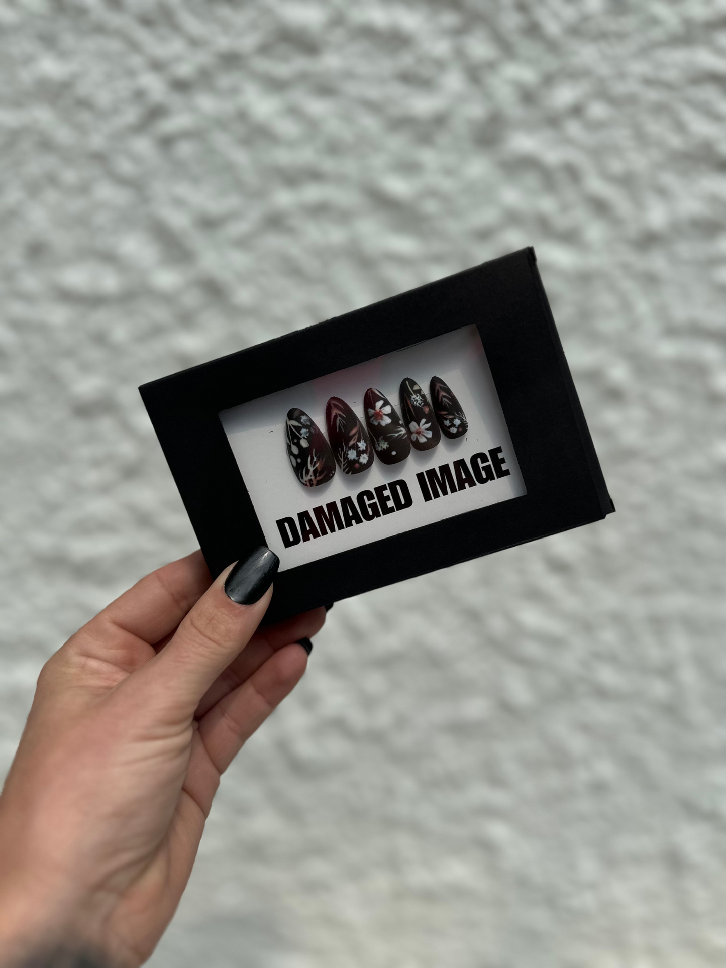 DAMAGED MANI-FESTATION
