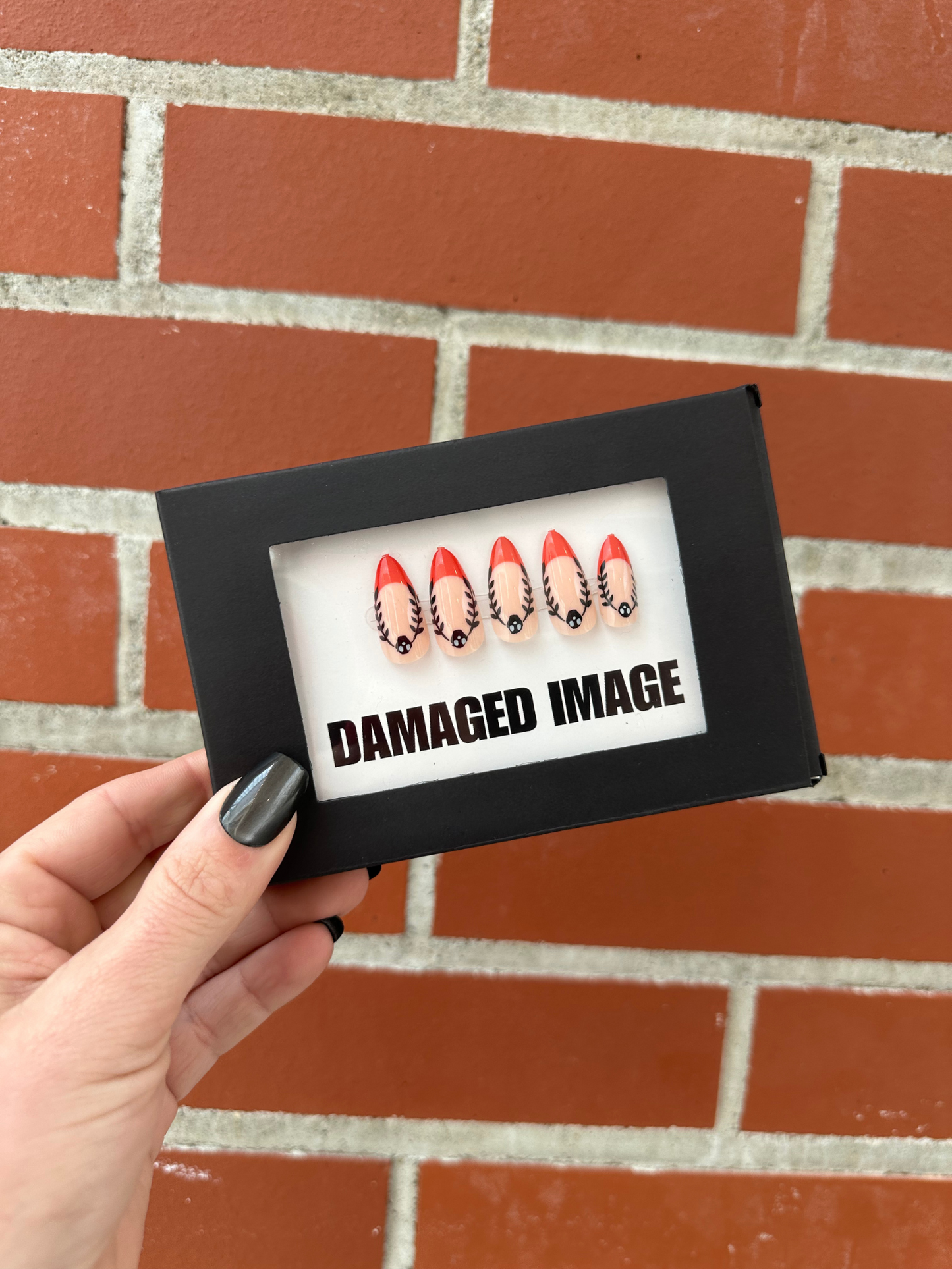 DAMAGED MANI-FESTATION