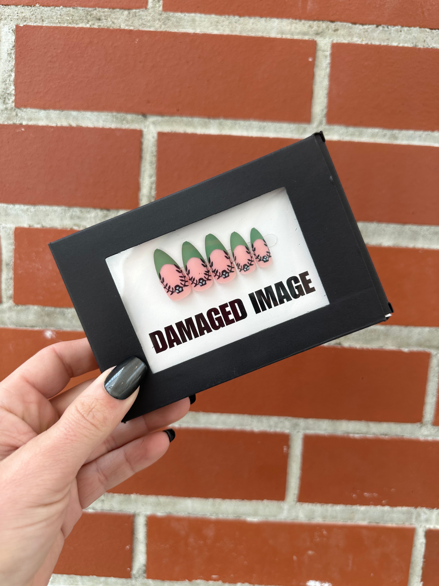 DAMAGED MANI-FESTATION