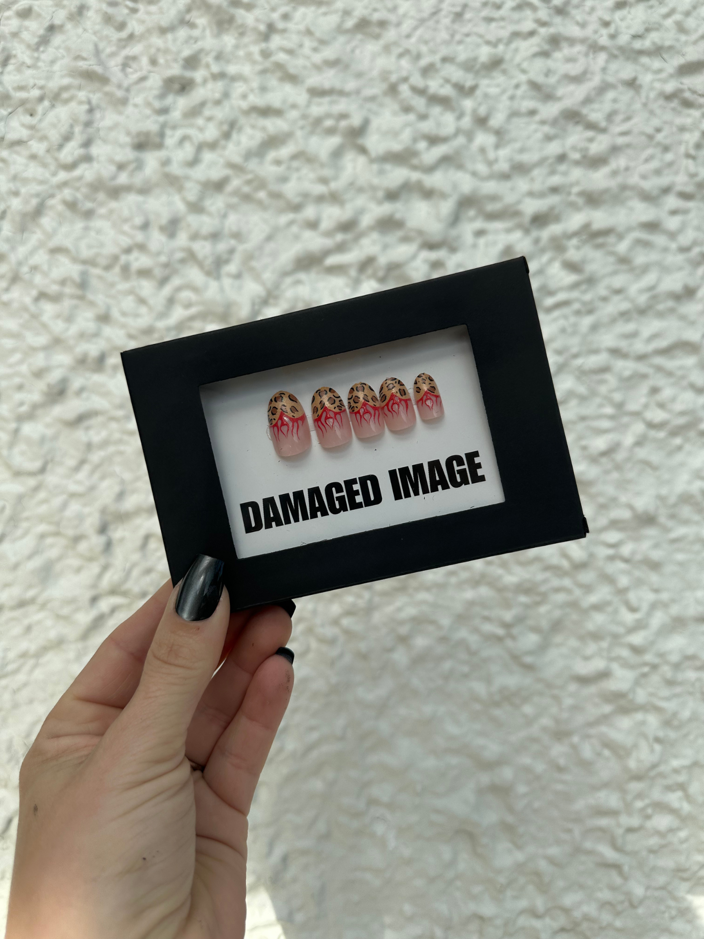 DAMAGED MANI-FESTATION