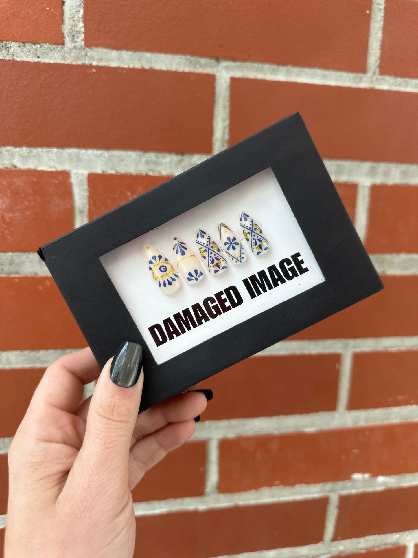 DAMAGED MANI-FESTATION