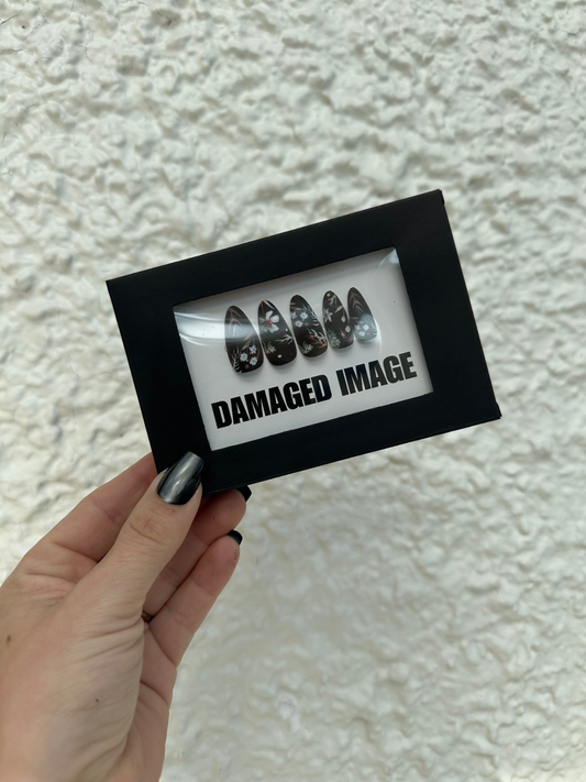 DAMAGED MANI-FESTATION